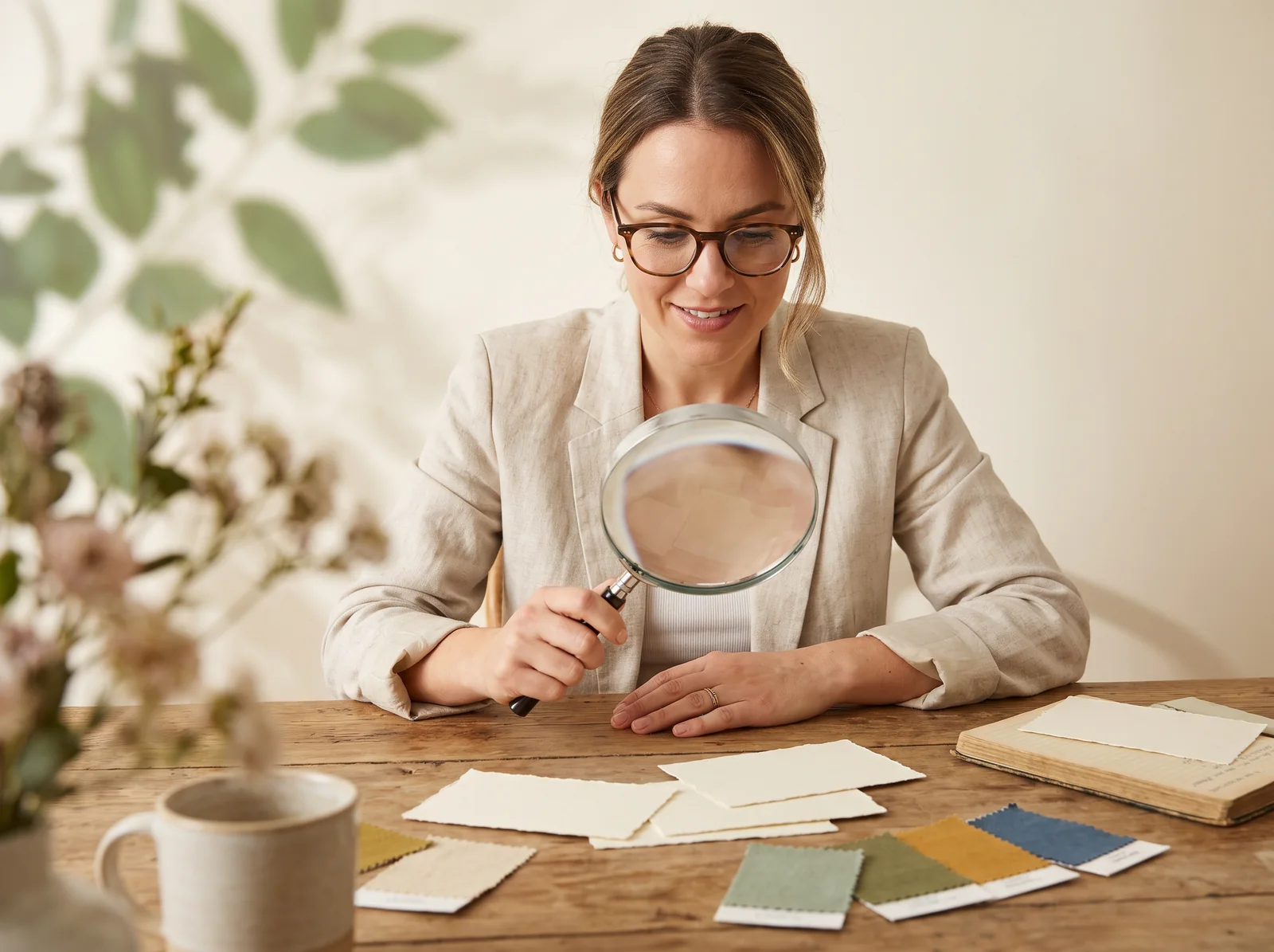 Researcher examining a research item closely
